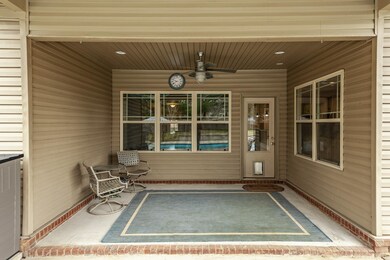 Rear Covered Porch with Ceiling Fan/Light.  Relaxing Outdoor Space, Even If It's Raining!
