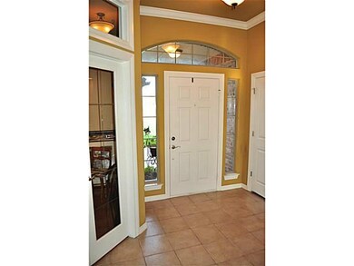 Other. Tiled interior entryway with a beautiful wi