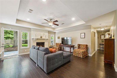 The living room flows into the backyard or down th