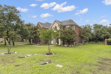 View of front of property featuring brick siding
