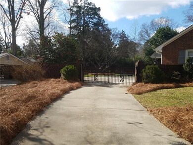 SIDE ENTRY DRIVEWAY WITH GATE AND LOTS PARKING
