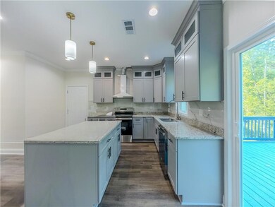 Kitchen featuring electric stove, wall chimney exhaust hood, a center island, tasteful backsplash, and dishwasher