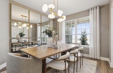 Airy dining room  *Photos of furnished model. Not 