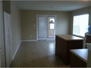 Kitchen. Kitchen and eating area.