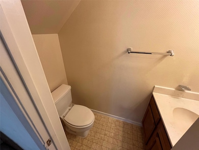 Bathroom featuring tile patterned flooring, vanity