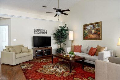 Great room view from the primary bedroom hall