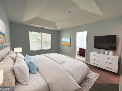 This primary bedroom is virtually staged but imagine what it will look like designed to your taste