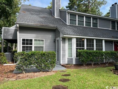 View of front of home with cooling unit and a fron