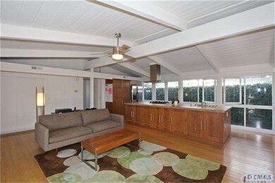 Great room facing the open, island kitchen.