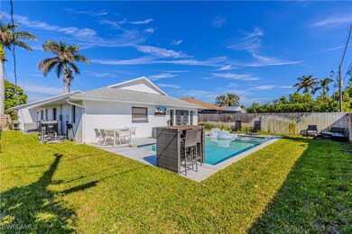 View of swimming pool with a yard and a patio area