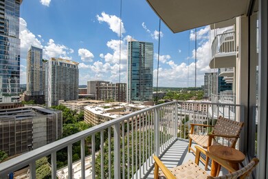 Balcony featuring a view of city