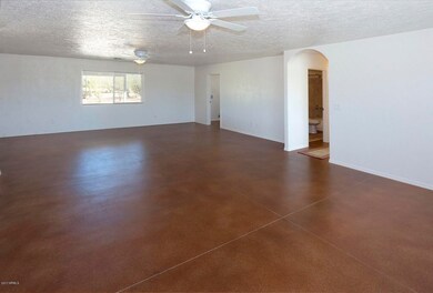 4  24230 E Cholla Rd