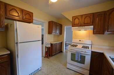 Kitchen opens to dining room