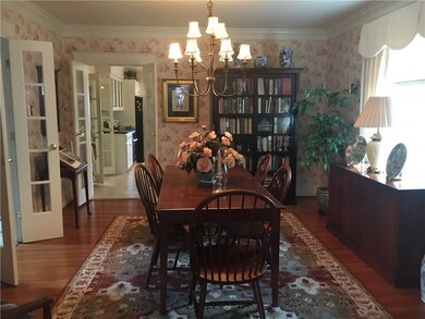 the formal dining room with French doors for charm
