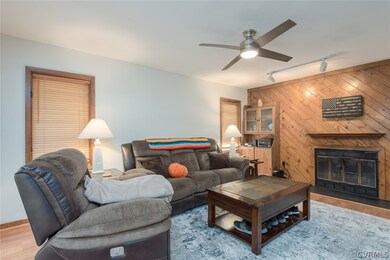 Gas fireplace on right is another cozy feature of this beautiful living room!