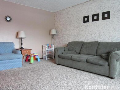 Bright living room.  Upper level has all new carpe