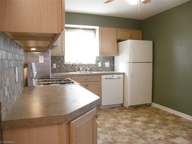 Remodeled with cabinets, flooring, backsplash and appliances.