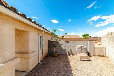 View of fenced backyard