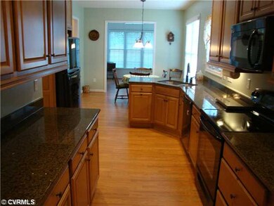 Kitchen - gorgeous maple cabinets plus granite top