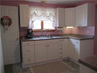 Kitchen. This pretty kitchen has plenty of counter