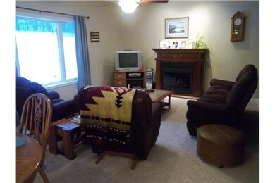 Other. Main level living room with electric firepl