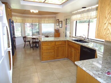 The kitchen and breakfast area bay windows with se