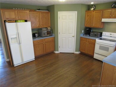 Kitchen features lots of cabinet space as well as 