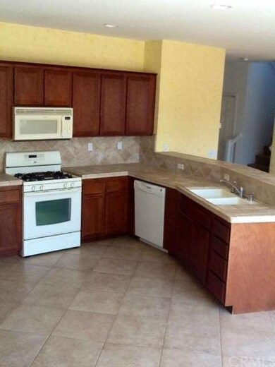 Tile kitchen with tumble stone counter tops!