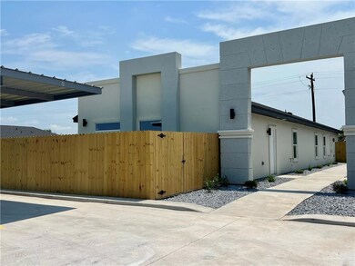 View of side of home with stucco siding
