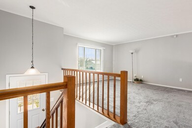Entryway Up to Spacious Living Room