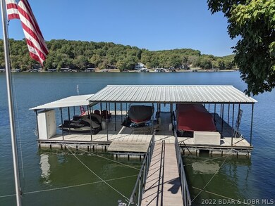 Awesome dock with concrete flooring, storage