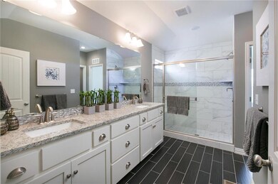 Master Bathroom *photos from a previous model*