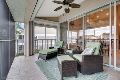 Sunroom featuring ceiling fan and lofted ceiling