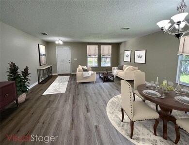 Living room / dining room, virtually staged
