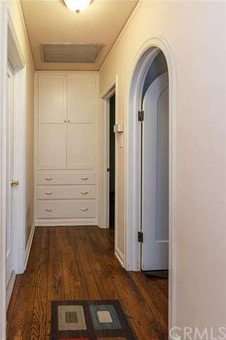 Hallway with storage.