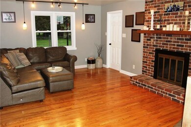 Family room with cozy fireplace.