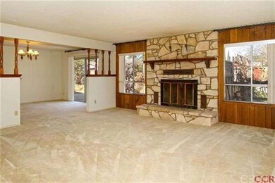 Living Room opens to formal dining room with slide
