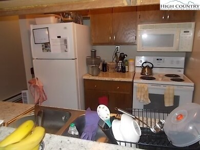 Kitchen includes refrigerator, stove and dishwashe