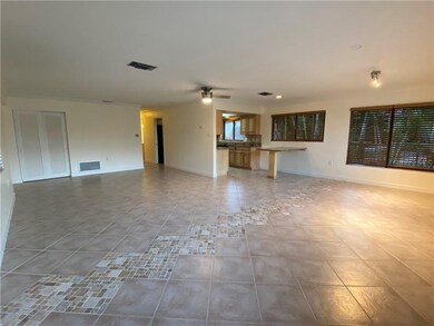 Large living area open to kitchen.