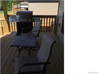 The back porch is covered and shady - perfect spot