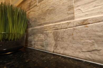 Granite Counters and Tile Backsplash