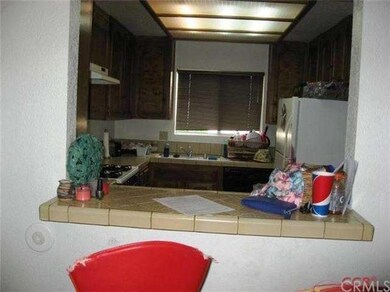 Looking from Dining Area into Kitchen through Pass