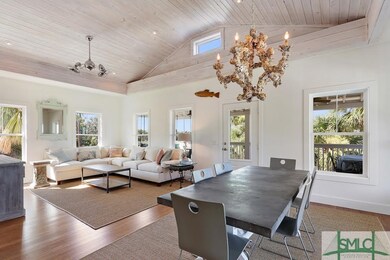 Open kitchen, dining and living room floor plan wi