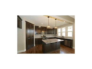 Light, Bright Kitchen With Stainless Steel Applian