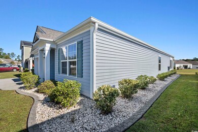 View of property exterior featuring a yard
