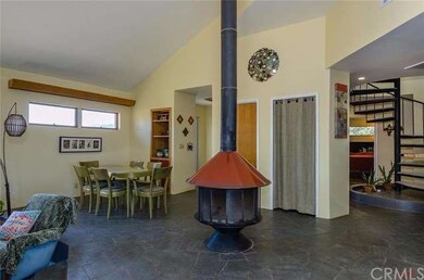 Freestanding Fireplace. The stairs in the back rig