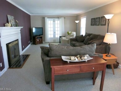 Living room - gas fireplace, French doors to 3 sea