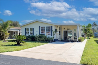 View of front of property with a front lawn and a