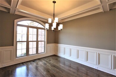 Formal Dining Room With Custom Trim Work