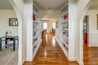 Very Welcoming Foyer with Beautiful Hardwoods and Built Ins